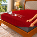 Maroon mattress protector